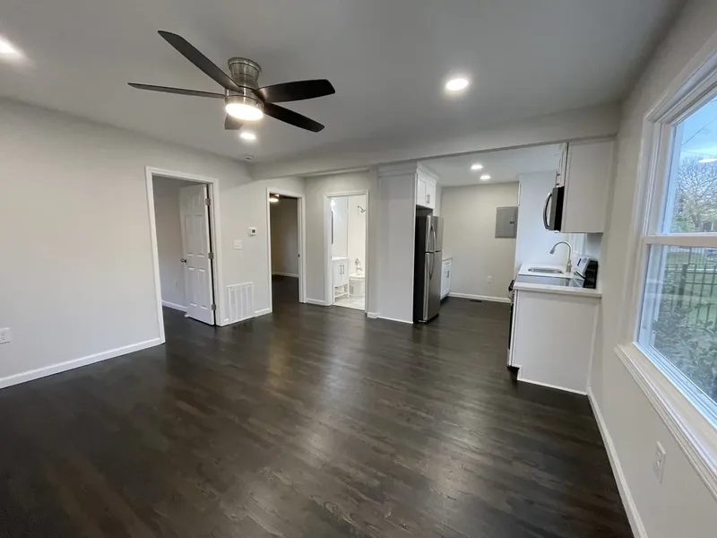 Open floor plan home renovation with hardwood floors